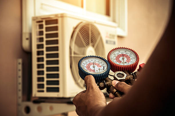 Professional Air Conditioning Service technician working in Fairland, OK